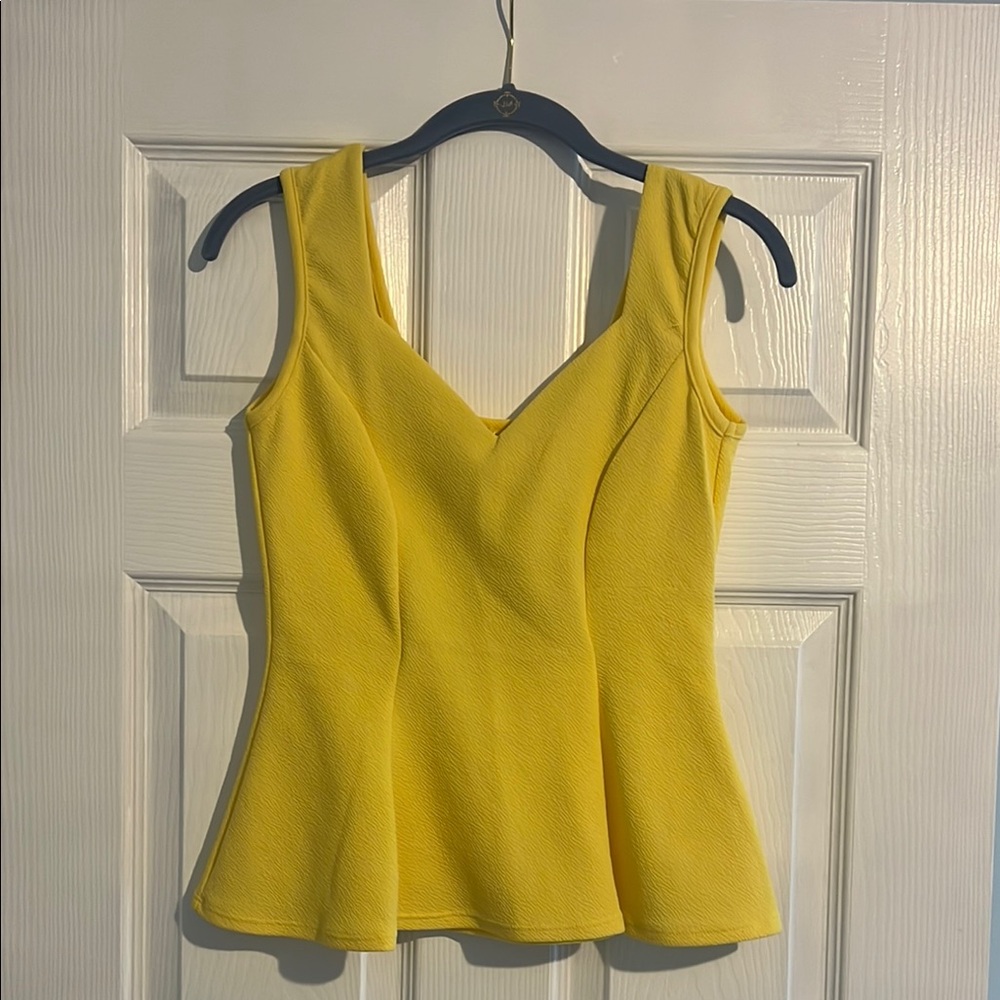 Yellow Sleeveless Peplum Top